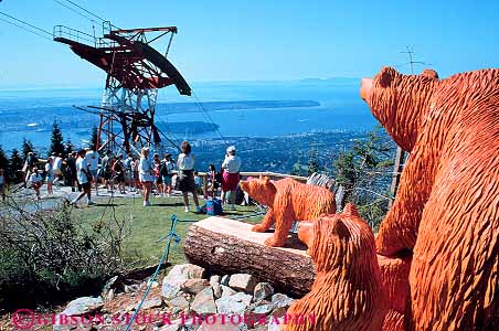 Stock Photo #12390: keywords -  bear british columbia grouse horz mountain sculpture sculptures statue summit tram trams vancouver wood