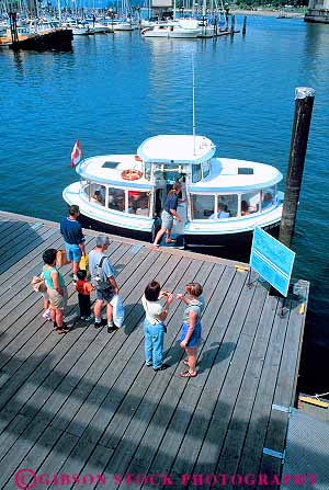 Stock Photo #12397: keywords -  boarding boat boats british columbia dock ferries ferry granville island passinger passingers people transport transportation vancouver vert water