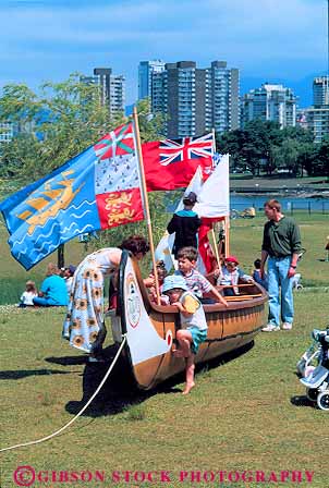 Stock Photo #12403: keywords -  british canoe canoes child children childrens columbia fair fairs festival festivals flags fun giant in kid kids outdoor outside parents play playing recreation summer vancouver vert