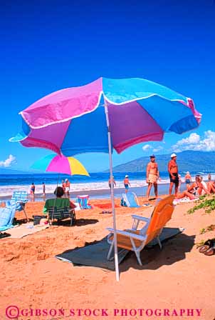 Stock Photo #8665: keywords -  beach beaches coast coastal color destination hawaii hawaiian island islands kamaole marine maritime maui ocean resort resorts sea seashore seawater shore shoreline surf travel tropical umbrella umbrellas usa vacation vert water