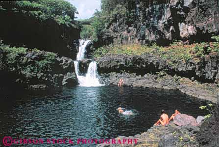 Stock Photo #8672: keywords -  creek destination gulch hana hawaii hawaiian horz island islands m maui oheo people pools resort resorts river seven strea swim swimmers swimming travel tropical usa vacation water waterfall