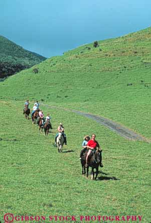 Stock Photo #8676: keywords -  adventure caravan caravans destination explore exploring group groups hawaii hawaiian hill horse horseback horses island islands maui pasture resort resorts ride riders riding tour tourists tours travel trip trips tropical usa vacation vert