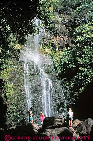 Stock Photo #13530: keywords -  children destination drop explore exploring fall falls families family gravity hana hawaii hawaiian hike hiker hikers hiking islands maui natural nature people released spray steep travel tropical vacation vert wailua water waterfall waterfalls