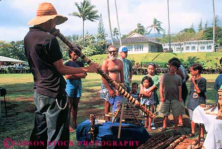Stock Photo #13532: keywords - blow blowing blows craft crafted crafts demonstrate demonstrates demonstrating destination didgeridoo didjeridu hana hand handmade hawaii hawaiian horz instrument instruments islands made man maui music musical noise play playing plays selling sound travel tropical vacation wind