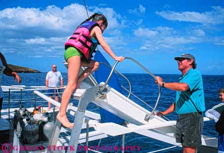 Stock Photo #8683: keywords -  boat boats coast coastal destination flotation fun girl hawaii hawaiian horz island islands life marine maritime maui ocean play recreation resort resorts sea seashore seawater shore shoreline slide sliding thrill travel tropical usa vacation vest water