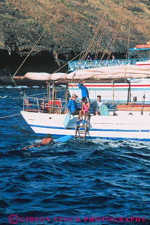 Stock Photo #13554: keywords -  activities activity boat charter dive diver divers dives diving fun hawaii hawaiian leisure maui ocean outdoor outside people person play playing plays recreation sail sailboat sea snorkel snorkelers snorkeling sport sports sunny sunshine swim swimming tropical vacation vert warm water