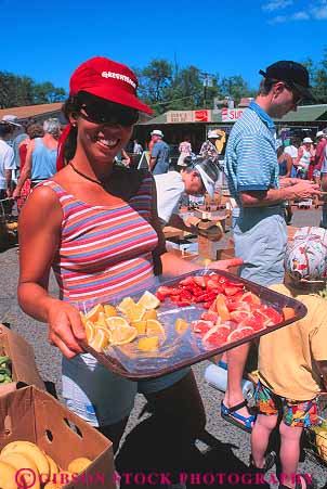Stock Photo #13557: keywords -  activities activity food fruit fun hawaii hawaiian host hostess hosting leisure market maui offer offering offers outdoor outside people person recreation samples snack snacks sunny sunshine tray tropical vacation vert warm woman