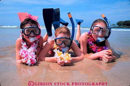 Stock Photo #13561: keywords -  activities activity and beach beaches child children cute dive diving female fins flower flowers fun funny gear girls hawaii hawaiian horz lei leis leisure mask maui necklace necklaces ocean outdoor outside people person play playing plays recreation released sea snorkel sport sports sunny sunshine tropical vacation warm water with