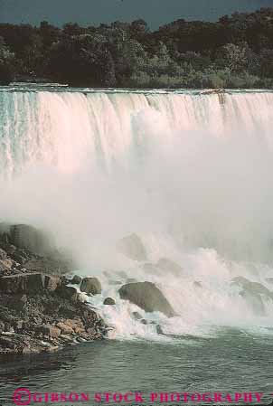 Stock Photo #13572: keywords -  churn churning churns erode eroded erodes eroding erosion fall falling falls flow flowing flows freshwater gravity great lakes landmark landmarks lawrence new niagara river rivers saint st st. turbulence turbulent vert water waterfall waterfalls york