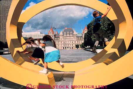 Stock Photo #13594: keywords -  albany capitol capitols child children empire government horz kid kids legislature new play playing plays plaza sculpture sculptures state york