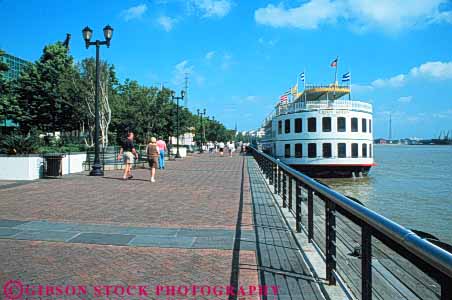 Stock Photo #7623: keywords -  america american architecture brick building buildings cities city french horz louisiana mississippi near new orleans quarter river riverboat riverboats urban usa walkway water waterfront
