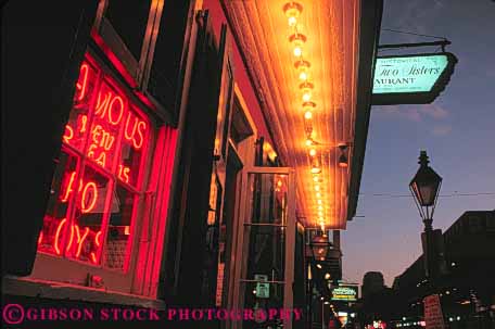 Stock Photo #8542: keywords - bourbon bright building buildings dark destination dusk evening french horz lighting lights louisiana new night orleans people quarter recreation sign signs social street streets travel usa vacation