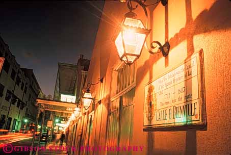 Stock Photo #8547: keywords -  bright building buildings commemorate commemorates dark destination dusk evening french historic horz lighting lights louisiana new night orleans people plaque quarter recreation social street streets travel usa vacation