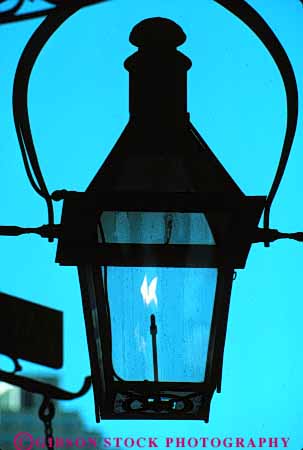 Stock Photo #8551: keywords - architecture building buildings design destination detail dusk flame flames french gas historic lamp lamps louisiana new old orleans quarter recreation silhouette silhouettes sky style tradition traditional travel usa vacation vert