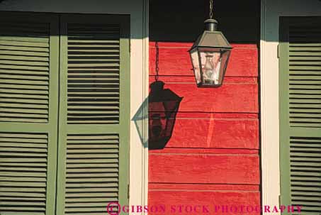 Stock Photo #8556: keywords - architecture building buildings design destination detail french hanging horz lamp lamps louisiana new orleans paint painted pattern quarter recreation shadow shadows shudder shudders travel usa vacation wall