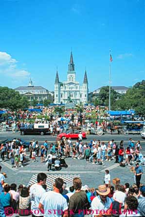 Stock Photo #8558: keywords -  cathedral crowd crowded destination grass jackson lawn louis louisiana new orleans outdoors outside park parks pedestrian pedestrians people recreation relax relaxed relaxes relaxing sidewalk square st summer sunny tourist tourists travel travelers usa vacation vert walk walking warm