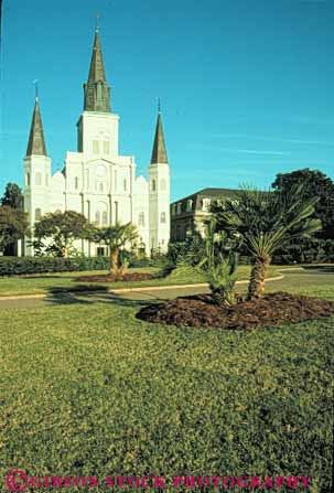 Stock Photo #8561: keywords -  cathedral cathedrals church churches destination grass jackson lawn louis louisiana new orleans park spire spires square st steeple steeples travel usa vert