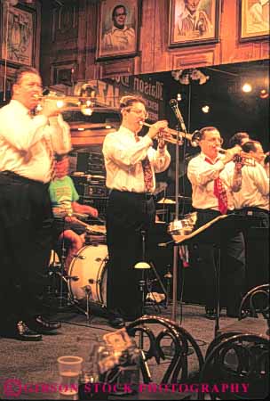 Stock Photo #8563: keywords - club destination group harmonize harmonizing harmony in instrument jazz louisiana man men music musical musician musicians new orleans perform performance performer performers performing recreation show sound team travel usa vacation vert