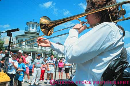 Stock Photo #8568: keywords -  brass destination festival horz instrument instruments jazz louisiana music musical musician musicians new orleans perform performance performer performers performing recreation show sound summer sunny travel trombone usa vacation wind