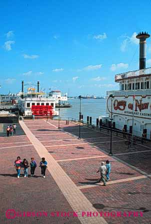Stock Photo #8578: keywords -  destination dock docks louisiana mississippi new orleans people recreation river riverboat riverboats riverfront travel usa vacation vert wharf wharfs