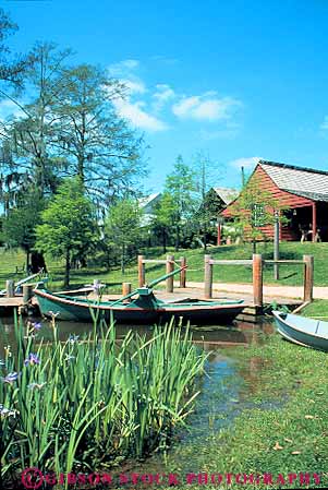 Stock Photo #13603: keywords -  attraction bayou bayous boat boats dock docks freshwater historic history lafayette living louisiana marsh marshes museum rowboat small south southern swamp swamps tourist travel vermilion vert village ville