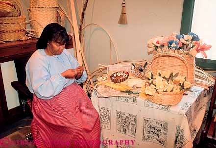 Stock Photo #13606: keywords - african american attraction bayou black craft crafter crafts craftsman craftsperson craftswoman era ethnic female hand handcrafting handicraft handicrafts historic history horz lafayette living louisiana minority museum skill south southern tourist travel vermilion village ville woman