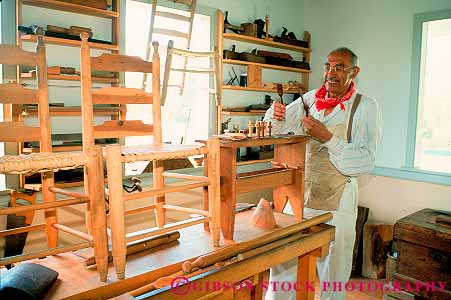Stock Photo #13607: keywords -  african american attraction bayou black cabinet cabinetmaker carpenter carpenters chair chairs craft crafter crafts craftsman craftsmen craftsperson era ethnic furniture hand handcrafting handicraft handicrafts historic history horz lafayette living louisiana maker makers male man minority museum skill south southern tourist travel vermilion village ville wood wooden