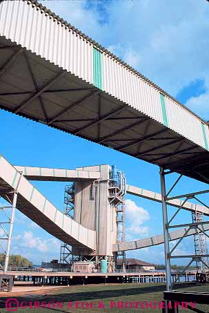 Stock Photo #13621: keywords -  agriculture angle angles building buildings conveyor conveyors crop elevate elevated elevator elevators enclosed enclosure equipment geometric geometrical geometry grain industrial industries industry lift lifted louisiana machine machinery south southern square support supported union vert