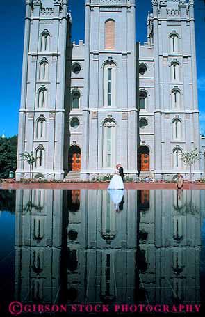 Stock Photo #12672: keywords -  affection and bride brides church churches city couple day front groom grooms in intimate lake latter love lovers man marriage married marry mormon of portrait pose posed reflect reflecting reflection reflects saints salt temple together utah vert vow vows wedding weddings woman