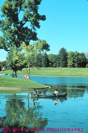 Stock Photo #9681: keywords -  boat boating canoe canoeing city couple in lake lakes landscape landscaping liberty park parks peaceful pond ponds recreation salt scenery scenic summer utah vert water