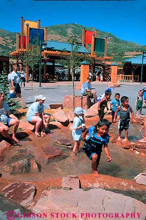 Stock Photo #12647: keywords - chicano children city cool cooling ethnic fountain fun hispanic hogle in lake minority mixed park parks play playing public race salt splash summer utah vert water zoo zoos