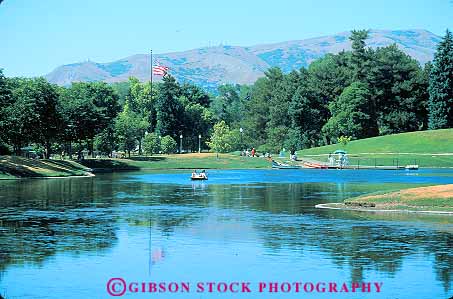 Stock Photo #12654: keywords -  boat city horz lake lakes liberty municipal park parks peddle people pond ponds public relax relaxing salt summer utah water