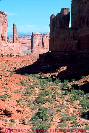 Stock Photo #13630: keywords -  arches avenue diminutive exposure formation formations geologic geological geology hike hiker hikers hiking in landscape landscapes national park parks people public recreation red redrock sandstone scenery scenic sedimentary slickrock small tiny trail utah vert walk walking