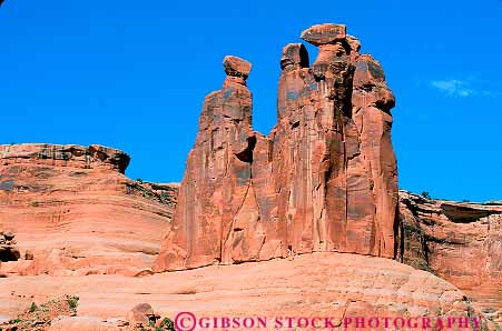 Stock Photo #13634: keywords -  arches exposure formation formations geologic geological geology gossips horz landscape landscapes national park parks public red redrock sandstone scenery scenic sedimentary slickrock three tower towers utah
