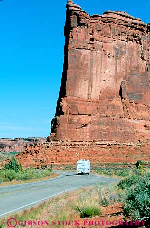 Stock Photo #13640: keywords -  arches exposure formation formations geologic geological geology landscape landscapes national park parks public recreational red redrock road roads rv rvs sandstone scenery scenic sedimentary slickrock trailer trailers travel traveler travelers utah vacation vehicle vehicles vert