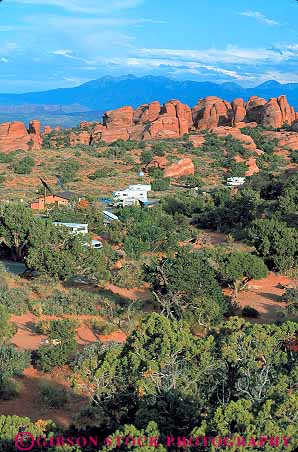 Stock Photo #13642: keywords - arches camp campers campground camping exposure formation formations geologic geological geology in landscape landscapes motorhome motorhomes national park parks public recreational red redrock rv rvs sandstone scenery scenic sedimentary slickrock trailers travel traveler travelers utah vacation vehicle vehicles vert