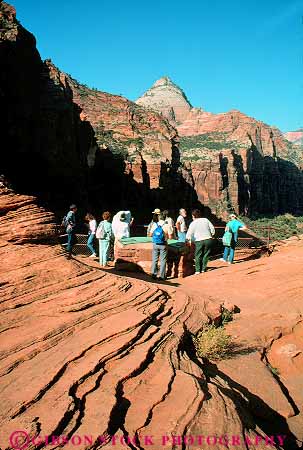 Stock Photo #12006: keywords -  canyon canyons ecology environment exploring habitat hike hikers hiking landscape landscapes mountains national park parks people preserve public red rock sandstone scenery scenic utah vert view zion