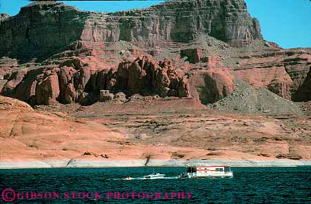 Stock Photo #12019: keywords -  area boat boating boats canyon cliff colorado glen horz houseboat houseboats lake lakes national outboard powell recreation reservoir river rock rocks sandstone southwest utah vacation water west western