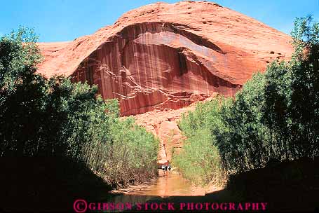 Stock Photo #12023: keywords -  arch arches area canyon canyons cliff cliffs creek deep dome domes erode eroded eroding erosion escalante formation forming geologic geological geology glen habitat hike hiker hikers hiking horz in mile narrow national nature park parks people recreation riparian river rock rocks sandstone slot southwest stream twentyfive utah wall water west western