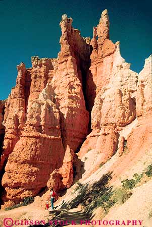 Stock Photo #12009: keywords -  and bryce canyon canyons child daughter ecology environment erode eroded eroding erosion explore exploring father garden habitat hike hikers hiking landscape landscapes mountains national parent park parks people preserve public queens red rock sandstone scenery scenic trail trails utah vert