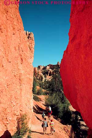 Stock Photo #12010: keywords -  bryce canyon canyons child ecology environment erode eroded eroding erosion explore exploring families family habitat hike hikers hiking landscape landscapes mountains national parent park parks people preserve public red rock sandstone scenery scenic street trail trails utah vert wall