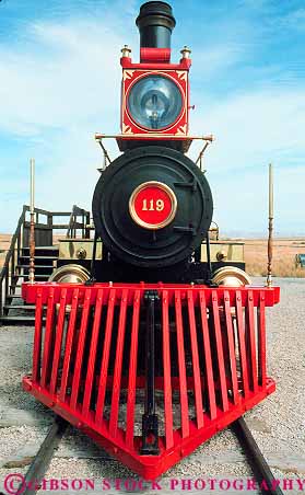 Stock Photo #13656: keywords -  american clean colorful duplicate duplicated engine engines equipment golden hardware heavy historic history identical locomotive locomotives national old painted park piece pieces pretty promontory public railroad railroads replica replicas replicate replicated shiny site sites spike steam train trains transcontinental utah vert vintage