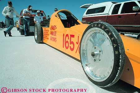 Stock Photo #13661: keywords - aerodynamic aerodynamics auto automobile autos bonneville car cars colorful compete competing competition contest design dragster dragsters engineered engineering equipment fast flat flats horz hotrod hotrods lakebed race racecar racer racers races racing salt shiny sleek smooth speed speedway utah vehicle vehicles wheel wheels yellow