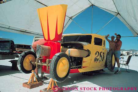 Stock Photo #13664: keywords -  aerodynamic aerodynamics auto automobile autos bonneville canopies canopy car cars colorful compete competing competition contest design dragster dragsters engineered engineering equipment fast flat flats horz hotrod hotrods lakebed race racecar racer racers races racing salt shade shiny shop sleek smooth speed speedway under utah vehicle vehicles