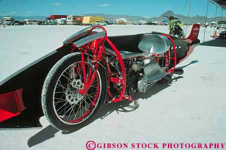 Stock Photo #13665: keywords -  aerodynamic aerodynamics auto automobile autos bonneville car cars colorful compete competing competition contest cutaway design dragster dragsters engineered engineering equipment fast flat flats half halves horz hotrod hotrods lakebed motorcycle motorcycles race racer racers races racing salt shiny side sleek smooth speed speedway utah vehicle vehicles view views