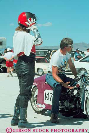 Stock Photo #13667: keywords -  aerodynamic aerodynamics auto automobile autos bonneville car cars colorful compete competing competition contest design dragster dragsters drive driver drives driving engineered engineering equipment fast female flat flats helmet helmets hotrod hotrods lakebed leather motorcycle motorcycles race racer racers races racing salt shiny sleek smooth speed speedway suit utah vehicle vehicles vert woman
