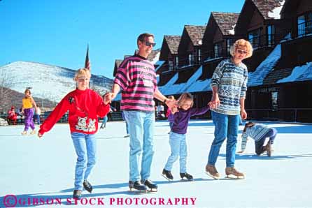 Stock Photo #9690: keywords - affection area areas assist assistance assisting assists balance balancing child children chilly city cold destination destinations family father freeze freezing froze frozen fun girl girls hands help helper helpers helping hold horz husband ice icy mother outdoor outside park play practice recreation released resort resorts rink rinks season share sister sisters skating ski snow sport sports sunny sunshine team teamwork together travel utah vacation wife winter youth