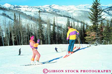 Stock Photo #9702: keywords -  area areas chilly city clothing cold colorful couple destination destinations downhill equipment horz park recreation resort resorts season ski skier skiers skiing snow sport sports travel utah winter