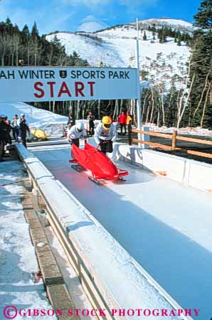 Stock Photo #9720: keywords -  aerodynamic bobsled bobsledding bobsleds chilly city cold colorful downhill fast freeze freezing froze frozen ice icy park push pushing race racer racers racing run season shape sled sledding sleds slide sliding slippery speed sport sports start team utah vert winter