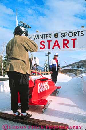 Stock Photo #9721: keywords -  aerodynamic bobsled bobsledding bobsleds chilly city cold colorful downhill fast freeze freezing froze frozen ice icy park race racer racers racing run season shape sled sledding sleds slide sliding slippery speed sport sports start utah vert winter